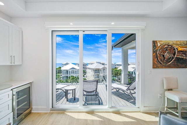 40 Cote D Azur Dr, Santa Rosa Beach, FL 32459 - entryway featuring beverage cooler, recessed lighting, light wood-style flooring, and baseboards