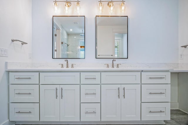 40 Cote D Azur Dr, Santa Rosa Beach, FL 32459 - full bath with a stall shower, double vanity, and a sink