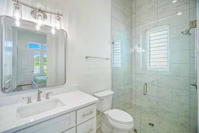 40 Cote D Azur Dr, Santa Rosa Beach, FL 32459 - ensuite bathroom featuring toilet, a shower stall, vanity, and ensuite bath