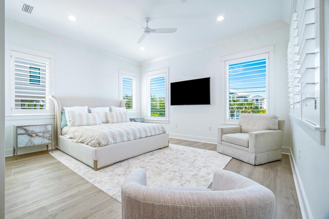 40 Cote D Azur Dr, Santa Rosa Beach, FL 32459 - bedroom featuring baseboards, visible vents, wood finished floors, and multiple windows