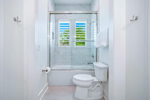 40 Cote D Azur Dr, Santa Rosa Beach, FL 32459 - bathroom with toilet, tile patterned flooring, bath / shower combo with glass door, and baseboards
