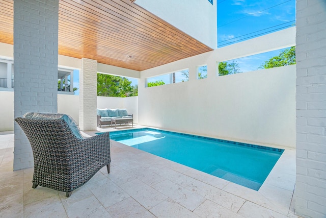 40 Cote D Azur Dr, Santa Rosa Beach, FL 32459 - view of pool featuring an outdoor hangout area, fence, a fenced in pool, and a patio area