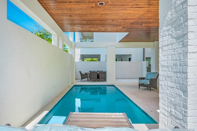 40 Cote D Azur Dr, Santa Rosa Beach, FL 32459 - view of swimming pool featuring outdoor dining space and a patio area