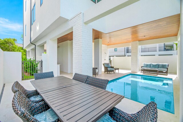 40 Cote D Azur Dr, Santa Rosa Beach, FL 32459 - view of pool featuring a patio, outdoor dining area, and a fenced in pool