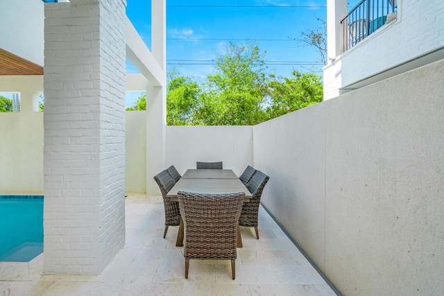 40 Cote D Azur Dr, Santa Rosa Beach, FL 32459 - view of patio with outdoor dining space and a fenced backyard