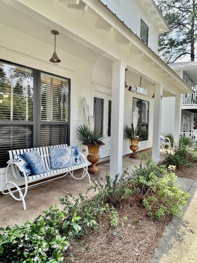 16 Kingfish St, Santa Rosa Beach, FL 32459 - view of patio featuring french doors and covered porch