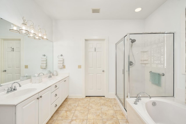 16 Kingfish St, Santa Rosa Beach, FL 32459 - bathroom with a shower stall, a garden tub, double vanity, and tile patterned flooring