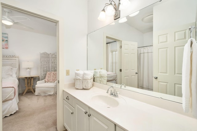 16 Kingfish St, Santa Rosa Beach, FL 32459 - full bath with ensuite bath, a ceiling fan, vanity, and vaulted ceiling