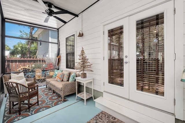 16 Kingfish St, Santa Rosa Beach, FL 32459 - sunroom featuring french doors, ceiling fan, concrete flooring, an outdoor hangout area, and wood walls