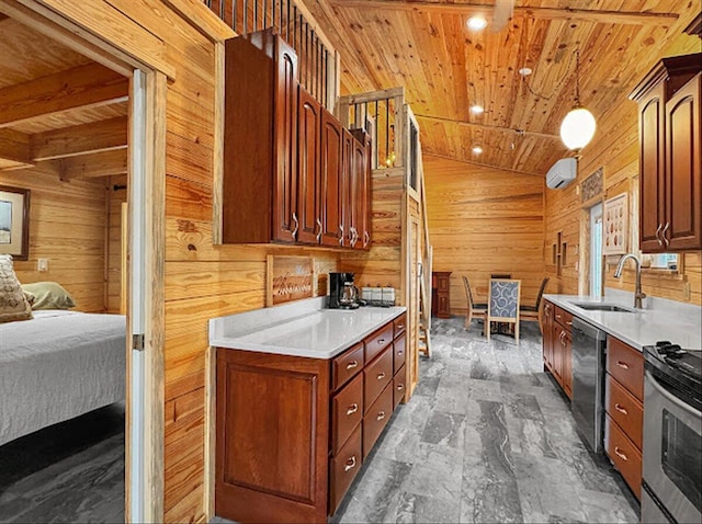 178 Osage Dr, Defuniak Springs, FL 32433 - kitchen with a sink, open floor plan, wood ceiling, stainless steel appliances, and wood walls