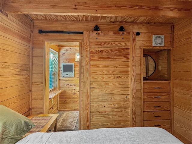 178 Osage Dr, Defuniak Springs, FL 32433 - bedroom with wood ceiling and wood walls