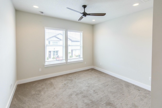 unfurnished room with baseboards, carpet flooring, and recessed lighting