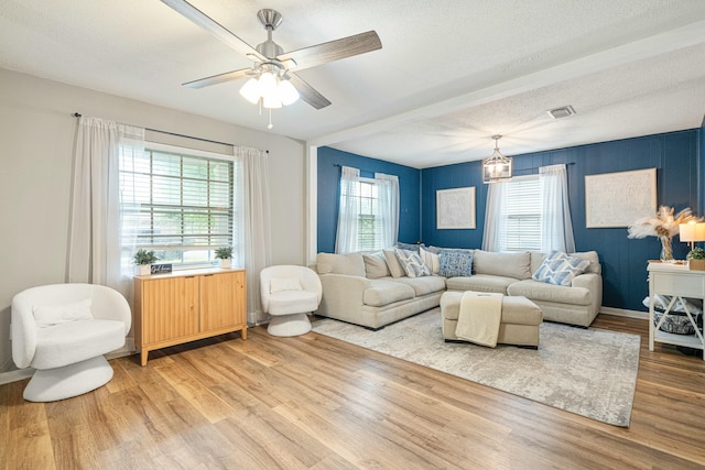 1017 Revere Dr, Pensacola, FL 32505 - living room with visible vents, light wood-type flooring, a ceiling fan, and baseboards