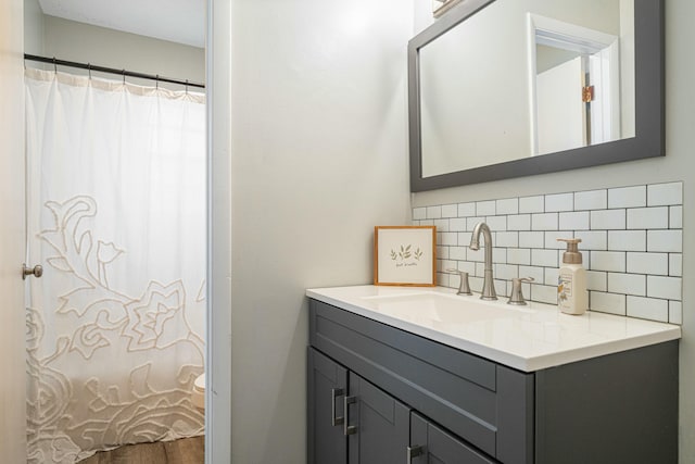1017 Revere Dr, Pensacola, FL 32505 - bathroom with tasteful backsplash, a shower with shower curtain, and vanity