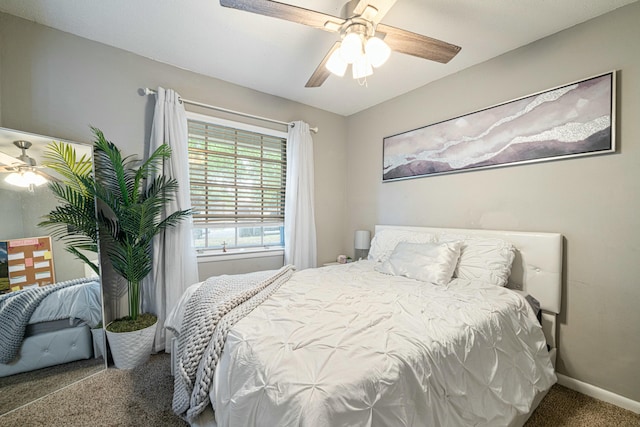1017 Revere Dr, Pensacola, FL 32505 - bedroom with ceiling fan, carpet floors, and baseboards