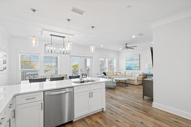 116 Riviera Dr, Panama City Beach, FL 32413 - kitchen featuring a sink, visible vents, recessed lighting, dishwasher, and ornamental molding