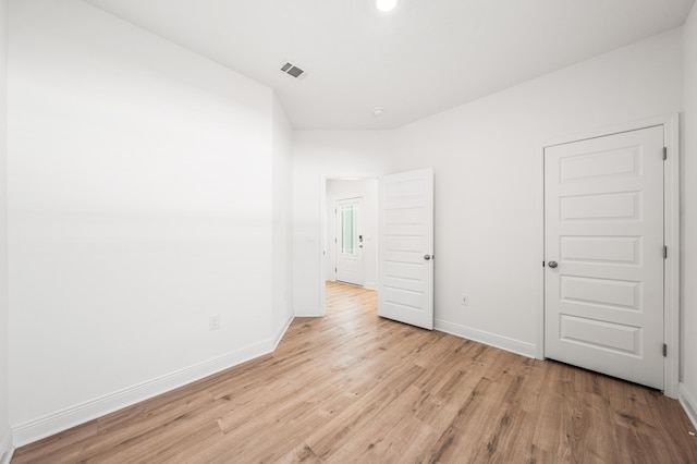 unfurnished bedroom with light wood-style floors, recessed lighting, visible vents, and baseboards