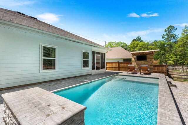 view of pool featuring a fenced backyard, a patio, and a fenced in pool