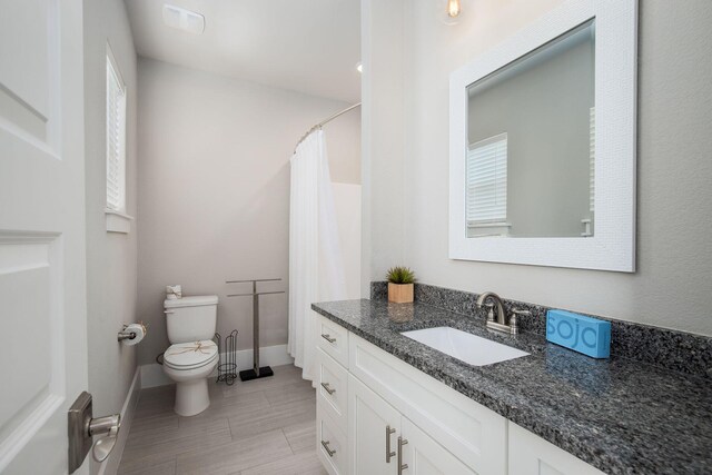 374 Gulfview Cir, Santa Rosa Beach, FL 32459 - full bath featuring baseboards, curtained shower, toilet, and vanity