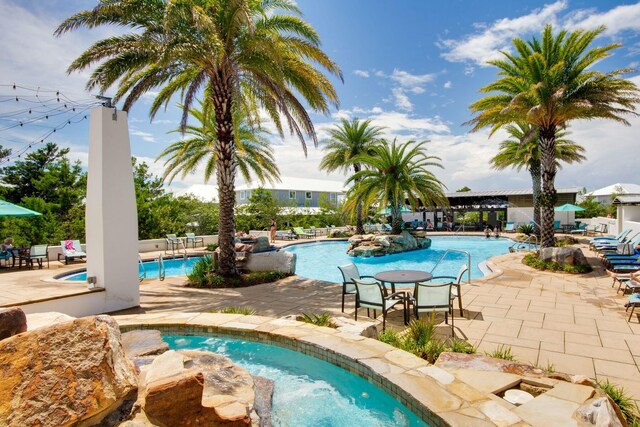 374 Gulfview Cir, Santa Rosa Beach, FL 32459 - community pool featuring a patio and a hot tub