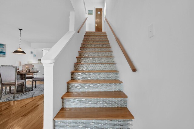 8522 Gulf Blvd Unit 20, Navarre, FL 32566 - stairway with wood finished floors
