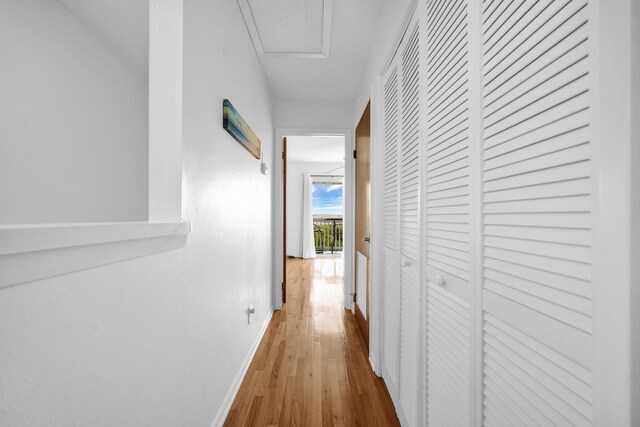 8522 Gulf Blvd Unit 20, Navarre, FL 32566 - hallway featuring wood finished floors and baseboards