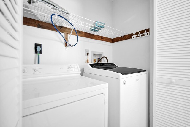 8522 Gulf Blvd Unit 20, Navarre, FL 32566 - washroom with washing machine and dryer and laundry area