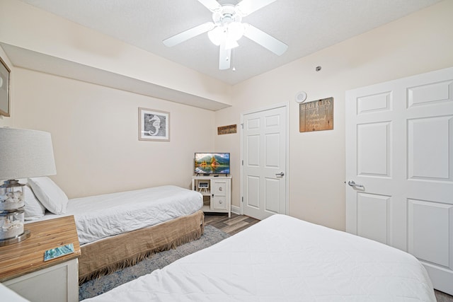 112 Seascape Dr Unit 707, Miramar Beach, FL 32550 - bedroom with a ceiling fan and wood finished floors