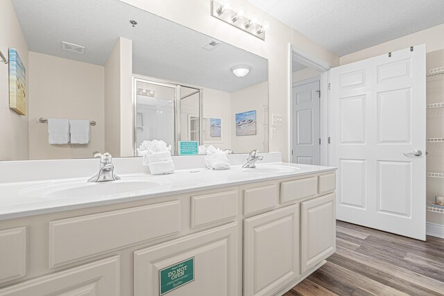 112 Seascape Dr Unit 707, Miramar Beach, FL 32550 - full bathroom featuring double vanity, a sink, and visible vents