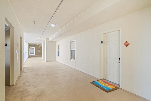 112 Seascape Dr Unit 707, Miramar Beach, FL 32550 - hallway with carpet floors
