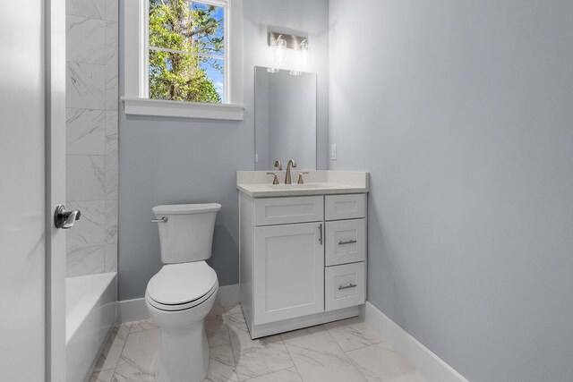 42 Central 8th St, Santa Rosa Beach, FL 32459 - bathroom featuring vanity, marble finish floor, baseboards, and toilet