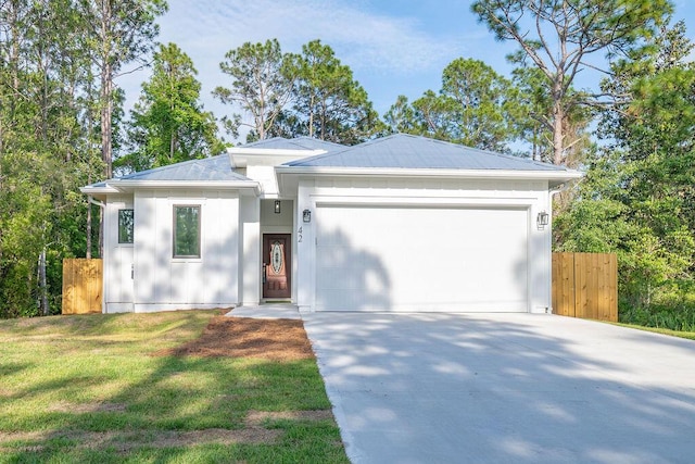42 Central 8th St, Santa Rosa Beach, FL 32459 - ranch-style home with a garage, fence, driveway, and a front yard