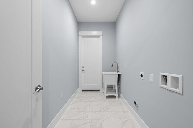 42 Central 8th St, Santa Rosa Beach, FL 32459 - washroom with washer hookup, hookup for an electric dryer, laundry area, baseboards, and marble finish floor