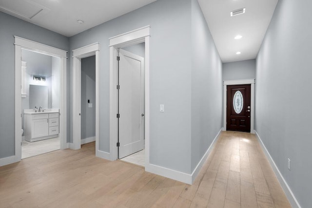 42 Central 8th St, Santa Rosa Beach, FL 32459 - hall with light wood-style floors, recessed lighting, baseboards, and visible vents
