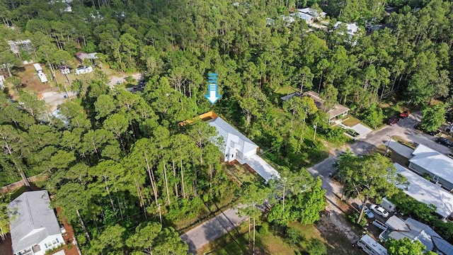 42 Central 8th St, Santa Rosa Beach, FL 32459 - birds eye view of property featuring a forest view