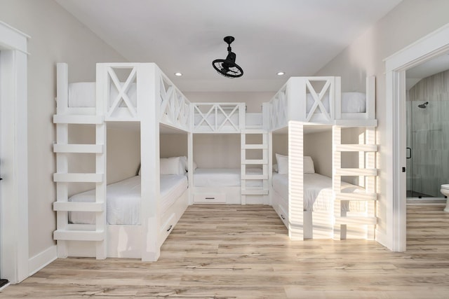 interior space with wood finished floors and recessed lighting