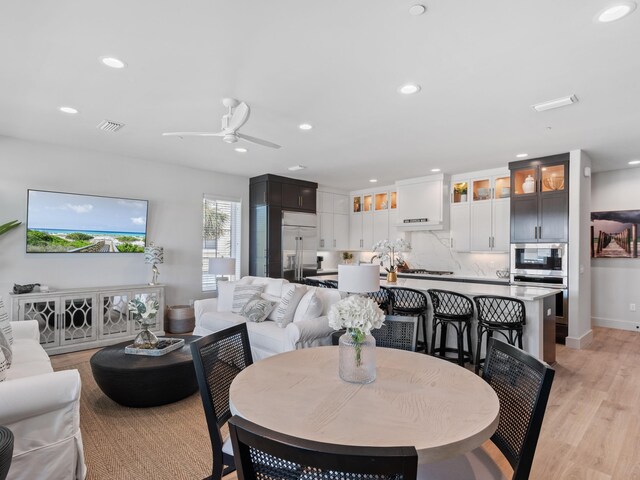 101 Deluna Pl Unit C, Panama City Beach, FL 32413 - dining area featuring recessed lighting, light wood-type flooring, visible vents, and ceiling fan