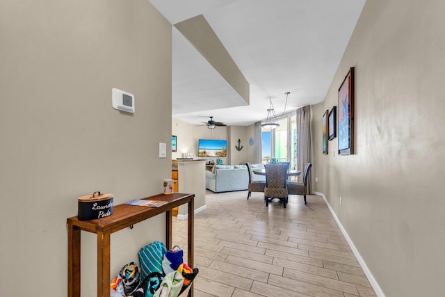 4207 Indian Bayou Trl Unit 2501, Destin, FL 32541 - hallway with light wood-style floors and baseboards