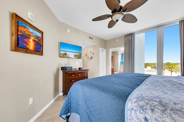 4207 Indian Bayou Trl Unit 2501, Destin, FL 32541 - bedroom featuring access to outside, ceiling fan, baseboards, light wood-type flooring, and visible vents