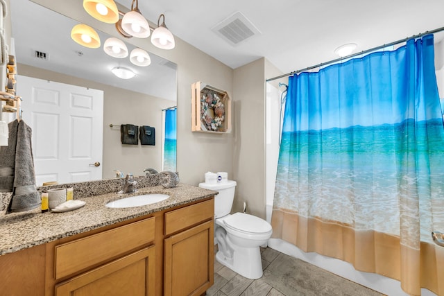 4207 Indian Bayou Trl Unit 2501, Destin, FL 32541 - bathroom with shower / bath combo with shower curtain, toilet, visible vents, and vanity