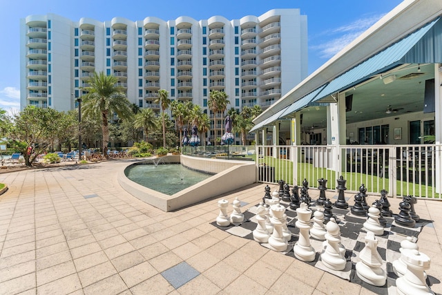 4207 Indian Bayou Trl Unit 2501, Destin, FL 32541 - view of swimming pool featuring fence and a ceiling fan