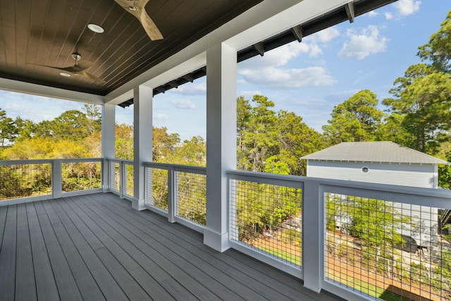 wooden terrace with ceiling fan