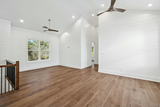 unfurnished living room with recessed lighting, ceiling fan, high vaulted ceiling, baseboards, and wood finished floors