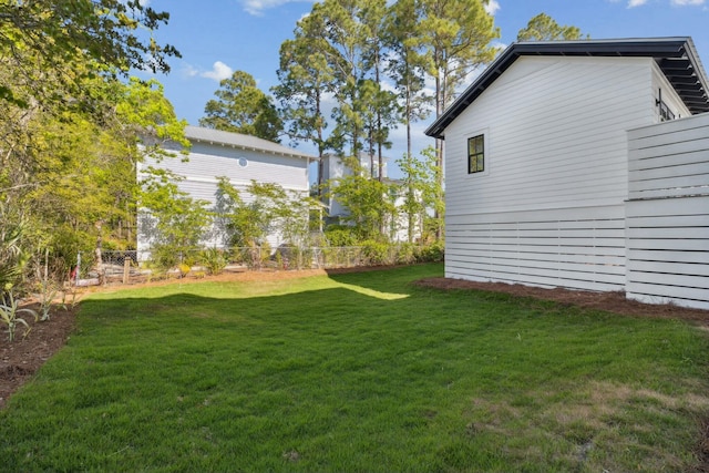view of yard featuring fence