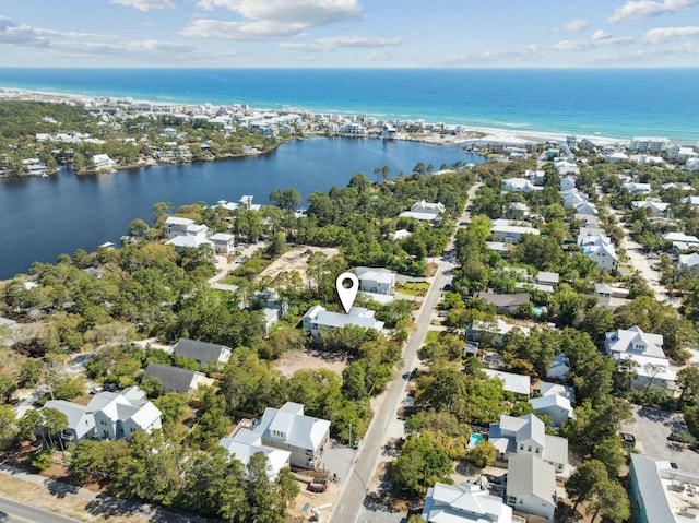 aerial view with a water view and a residential view