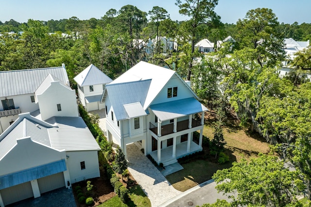 birds eye view of property with a residential view