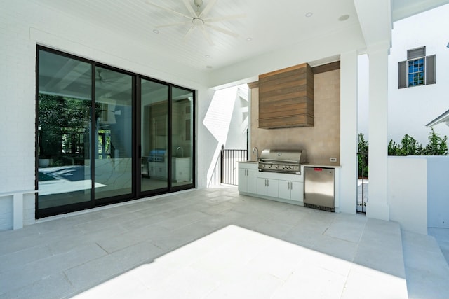 view of patio / terrace featuring a ceiling fan, grilling area, area for grilling, and a sink