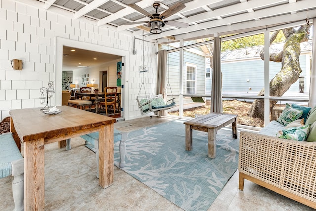sunroom with beamed ceiling