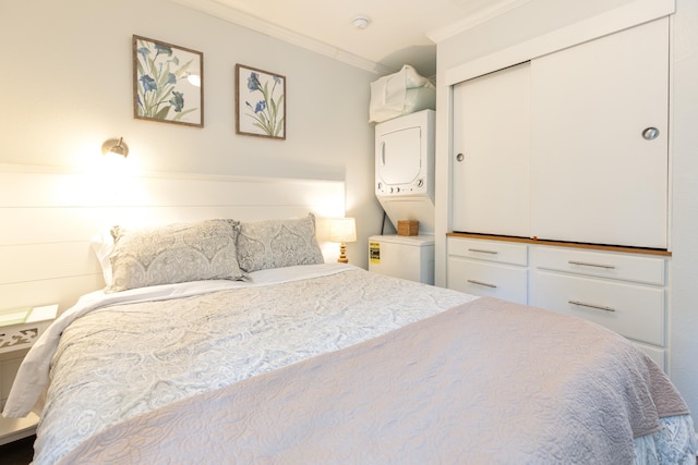 bedroom with a closet and crown molding