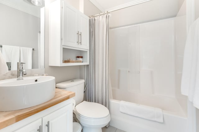 full bathroom featuring toilet, shower / bath combination with curtain, and vanity